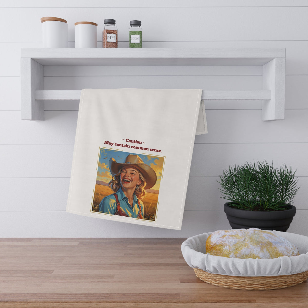 tea towel featuring woman in cowboy hat