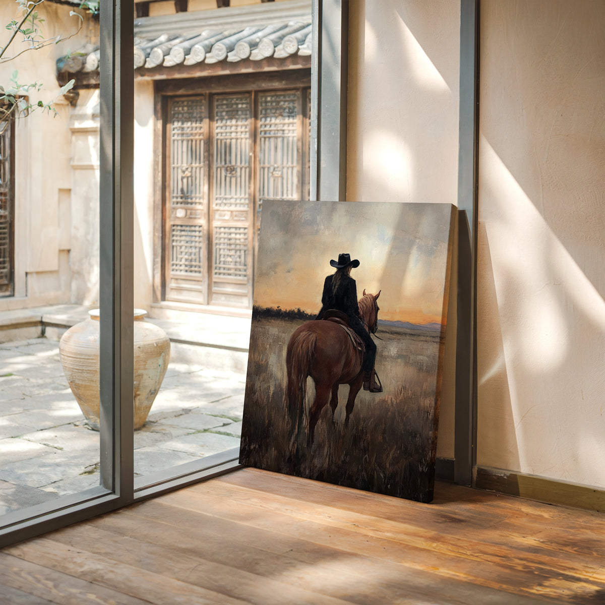 Canvas print of a person on horseback in a rustic setting leaning against a wall.