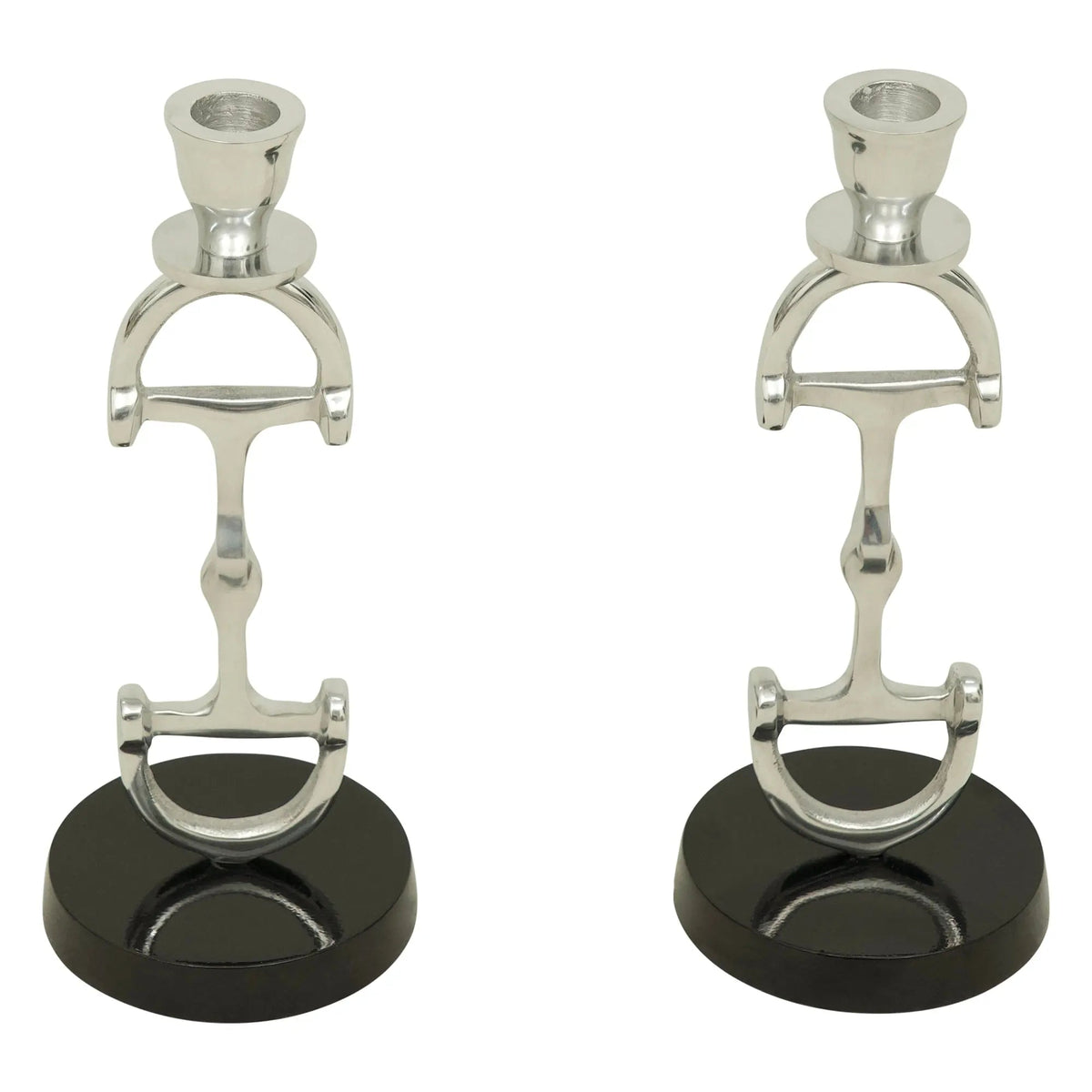 Two silver equestrian bit candle holders on black bases against a white background