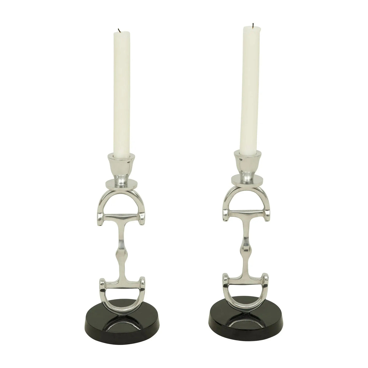 Two candle holders with horsebit design on black bases against a white background