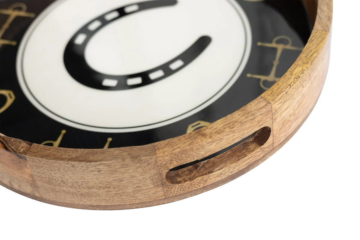 Close-up of a wooden tray with a black and white face on a white background