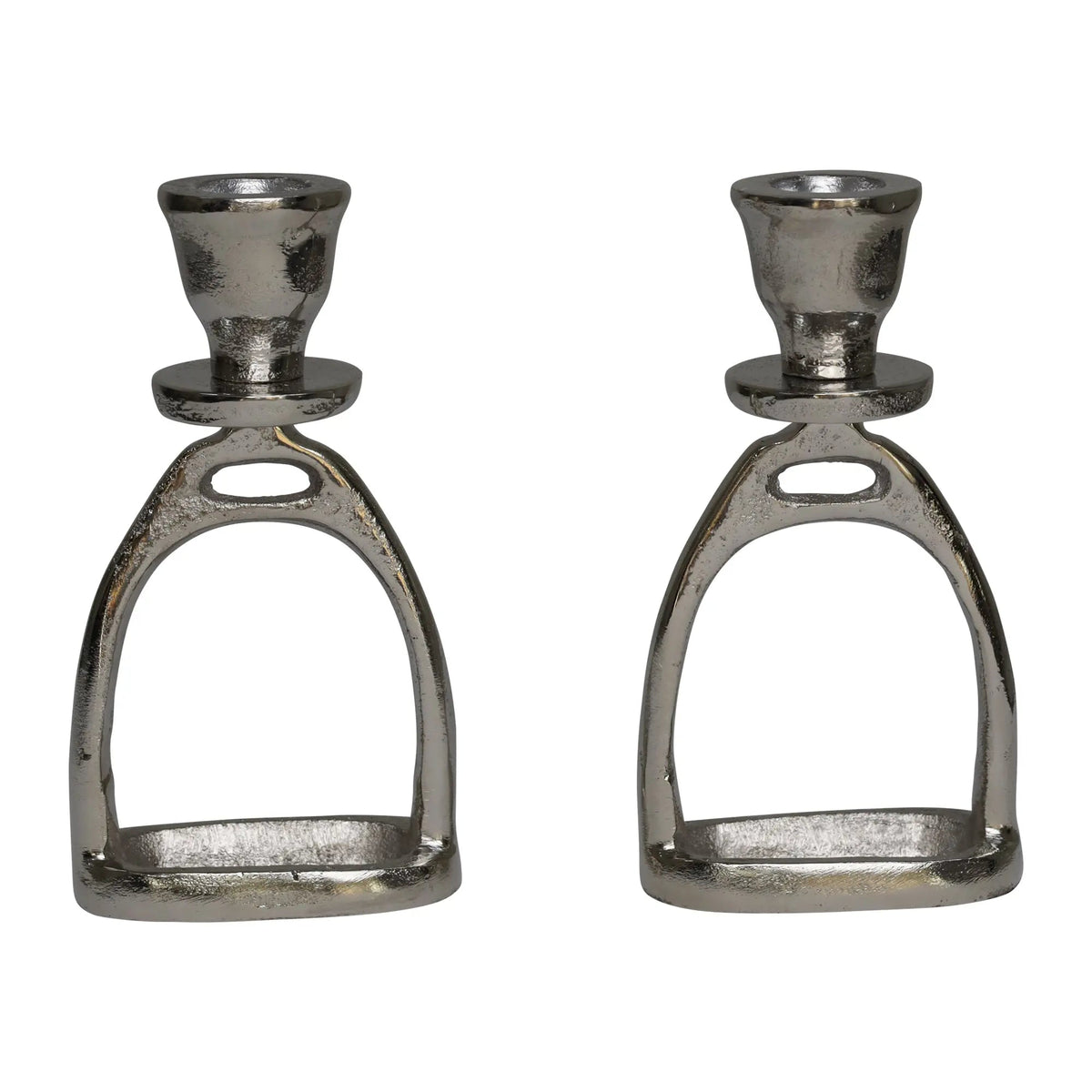 Two metallic candle holders shaped like horse stirrups on a white background