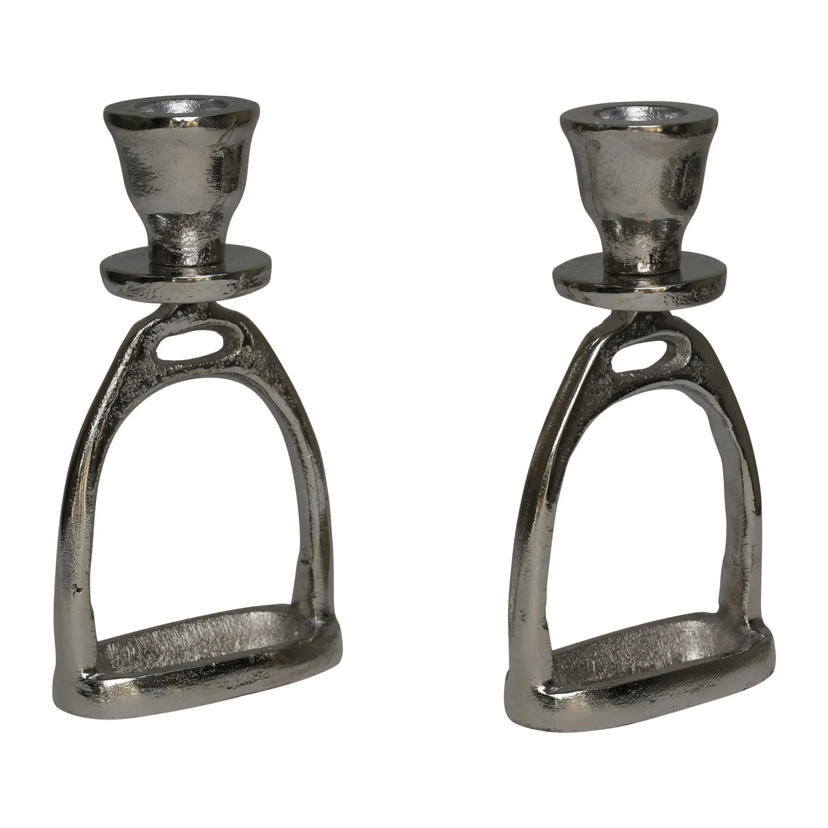 Two metallic candle holders shaped like horse stirrups on a white background