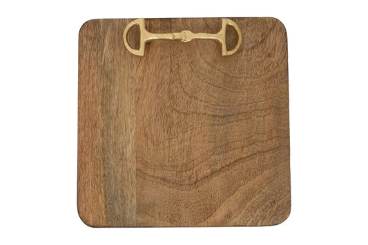 Wooden cutting board with a brass horse bit design on a white background