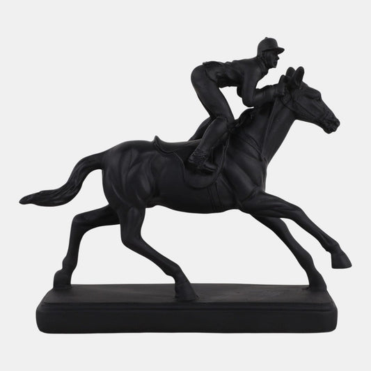 Black sculpture of a person riding a horse on a white background