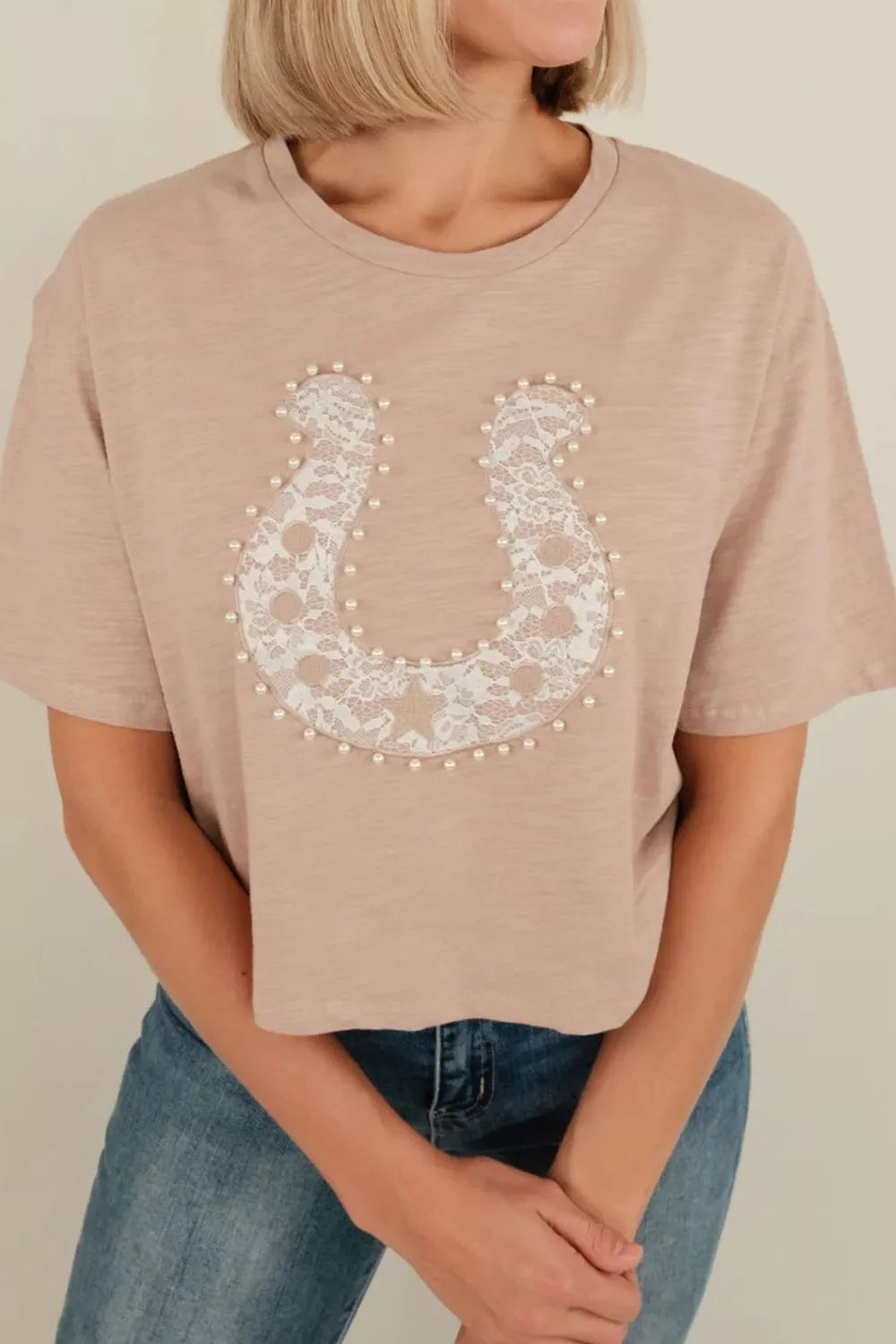 Pale blush T-shirt with lace horseshoe and pearl detail