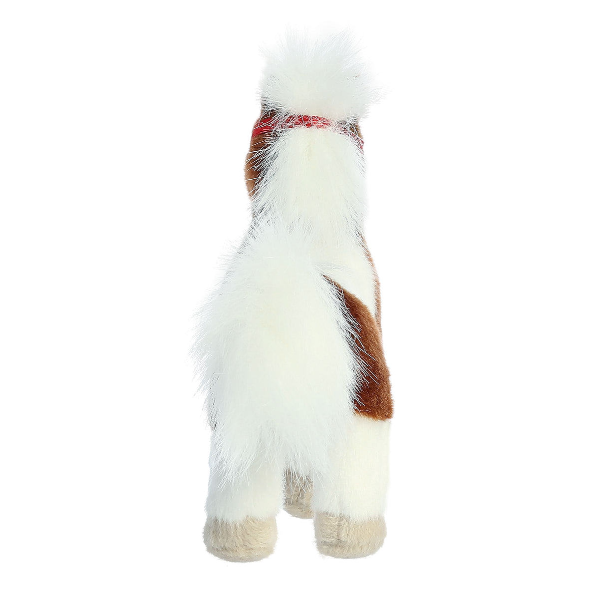 Plush toy resembling a horse with white body, brown mane, and red blanket on a white background