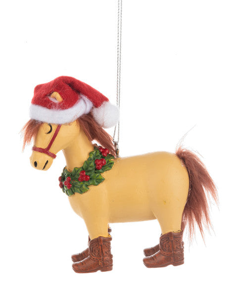 Horse Christmas ornament with a Santa hat, wreath, and boots on a white background